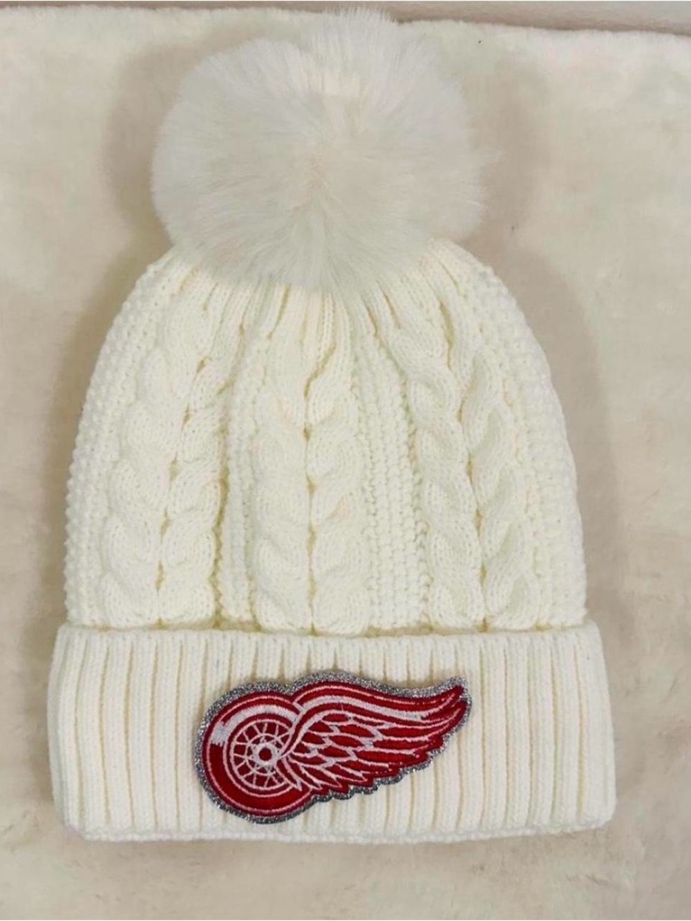 Detroit red wings NHL Cream Cable-Knit Pom Beanie with Red Wing logo